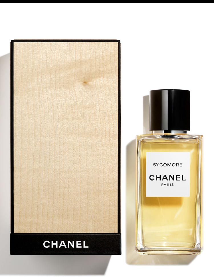 CA bottle of SYCOMORE Eau de Parfum next to it's limited-edition, exclusive case